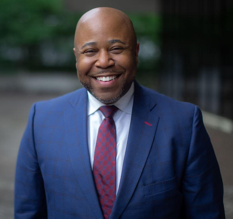 Attorney smiling in professional attire